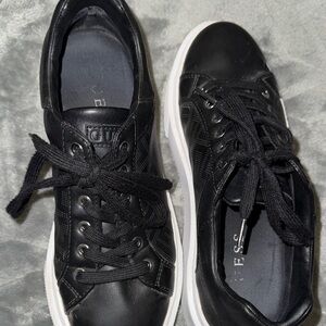 Guess black and white low-top sneakers with a classic design